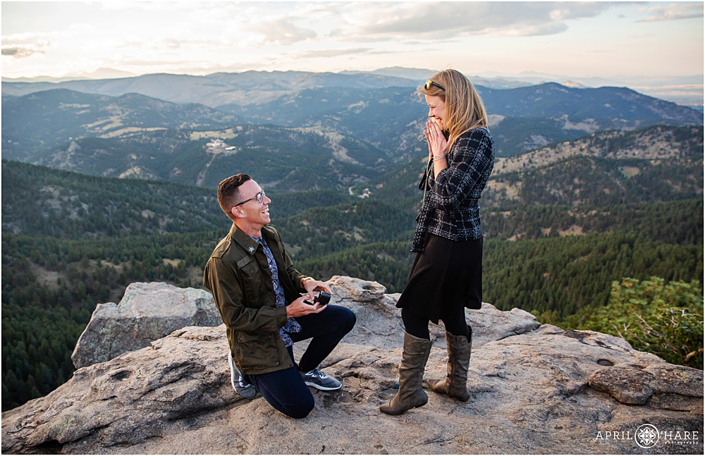 Man proposes to his girlfriend at sunset at Lost Gulch overlook in Boulder CO