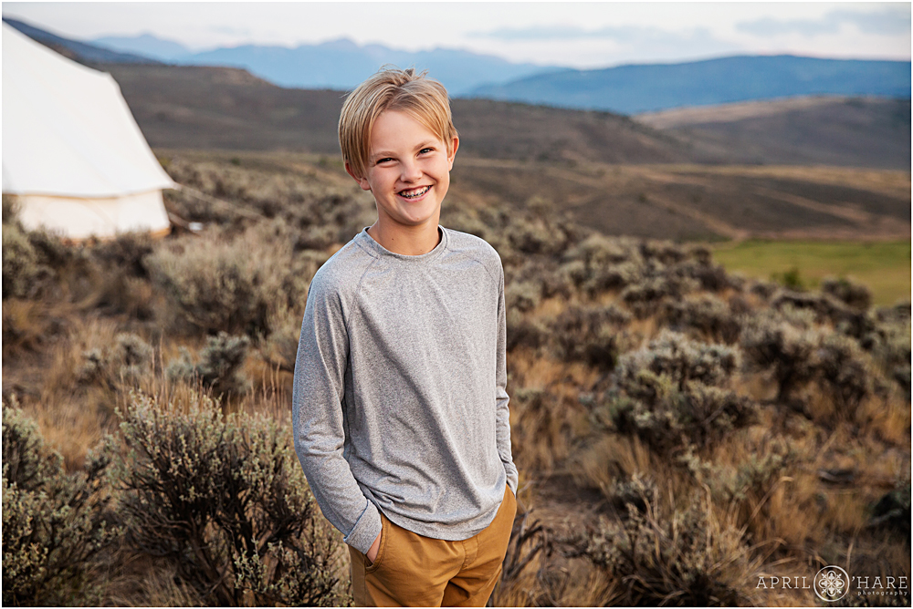 Happy young boy during family photos in Vail Colorado