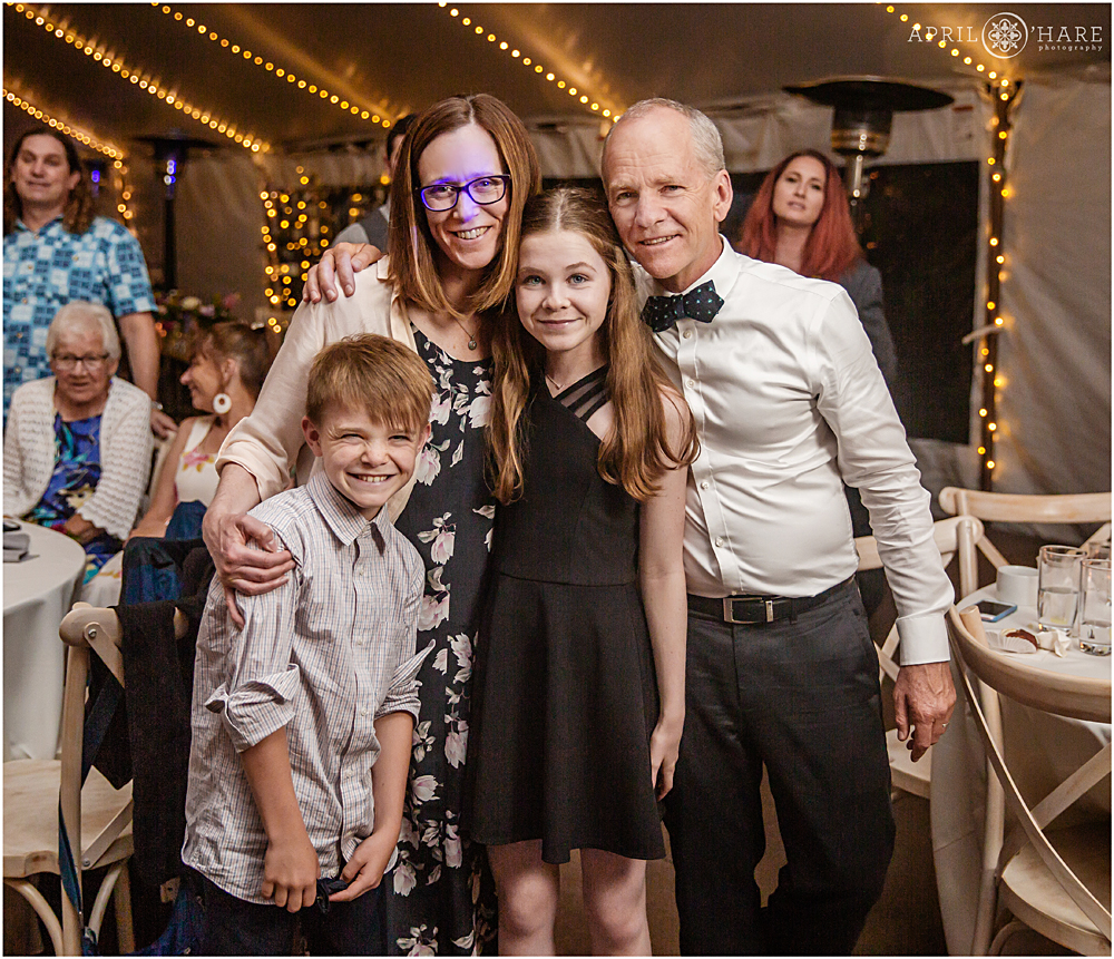 Candid family portrait at a Colorado wedding reception