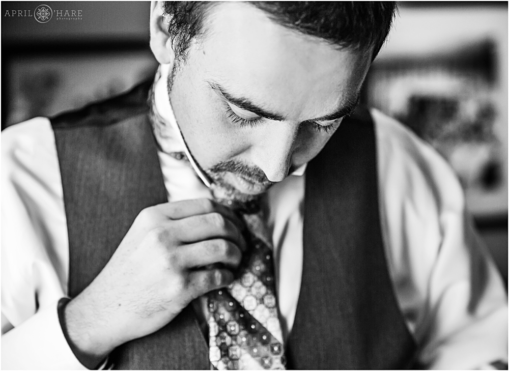 Groom preps for his wedding day at Blackstone Rivers Ranch