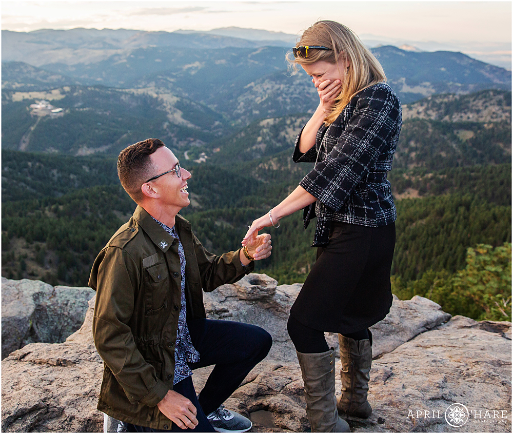 Happy girl says yes to a proposal at Lost Gulch Overlook in Boulder Colorado