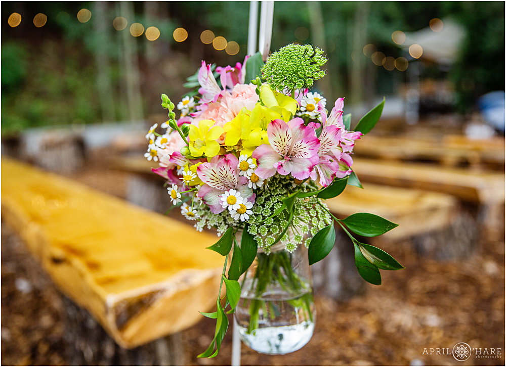 Pretty floral aisle decor for an outdoor wedding at Blackstone Rivers Ranch
