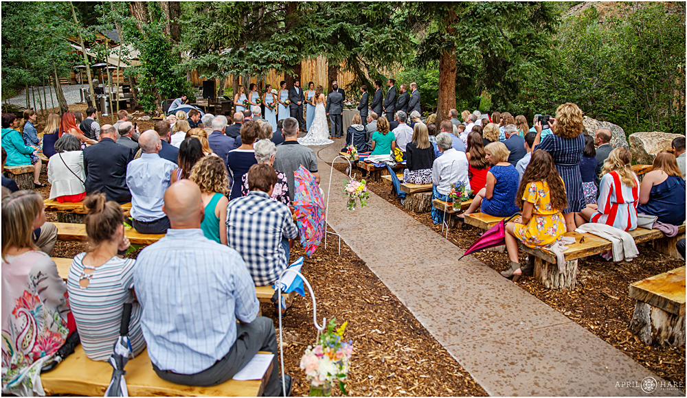 Outdoor wedding ceremony at Blackstone Rivers Ranch in Idaho Springs CO