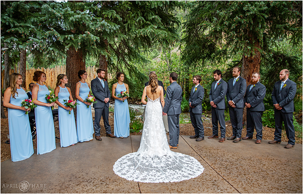 Wedding party all lined up during wedding ceremony at Blackstone Rivers Ranch in CO