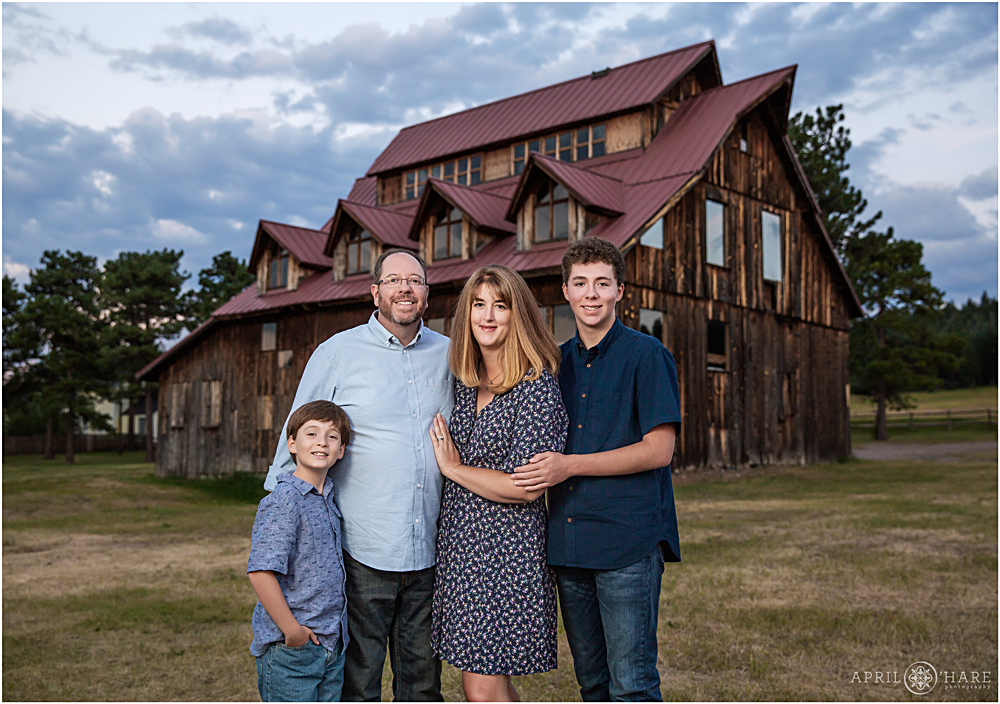 Old rustic mountain barn on a homestead in Colorado Family Portrait
