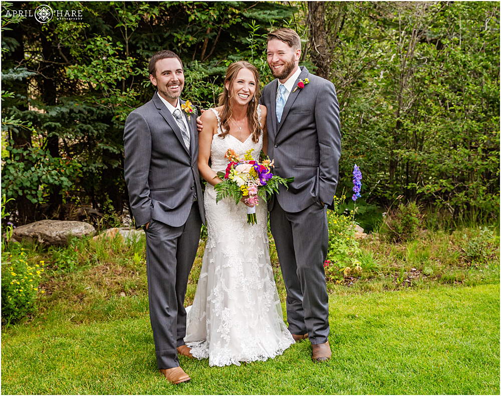 Candid family portrait from an outdoor summer wedding at Blackstone Rivers Ranch 