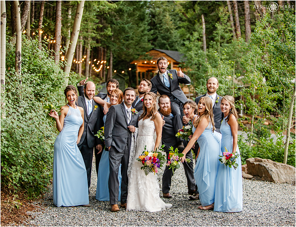 Fun candid group photo of entire wedding party at Blackstone Rivers Ranch