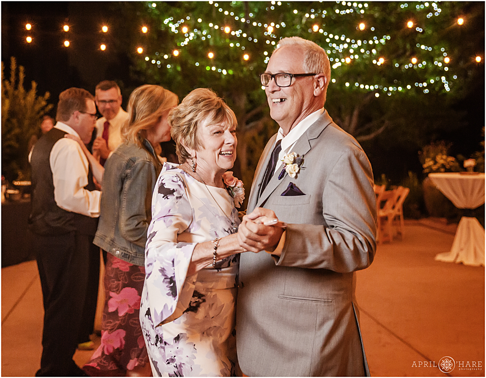 Dancing on the patio at a Chatfield Farms wedding reception