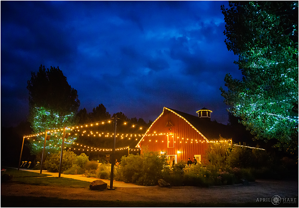 The Green Farm Barn at Littleton Garden Wedding Denver Botanic Gardens Chatfield lit up at dusk