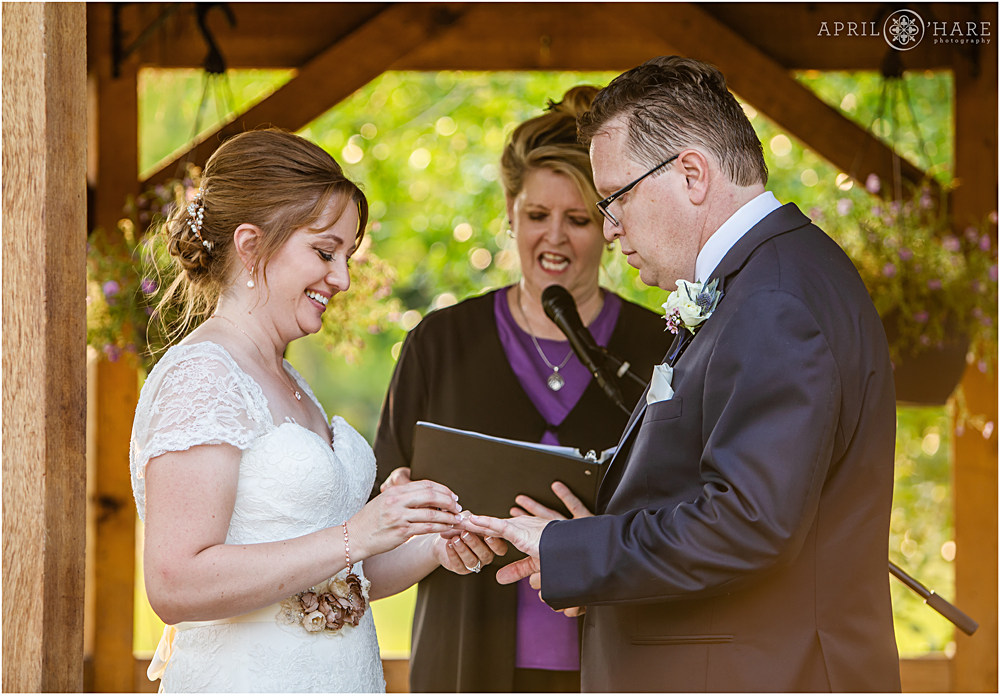 Exchanging Rings in the Gazebo at a Littleton Garden Wedding