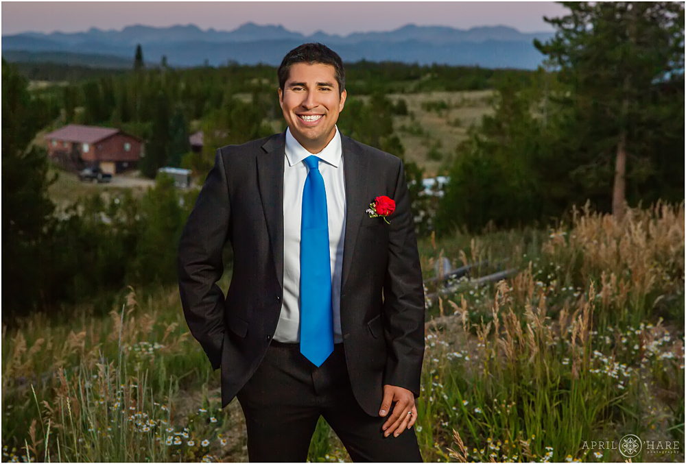 Groom portrait at sunset mountain backdrop Snow Mountain Ranch