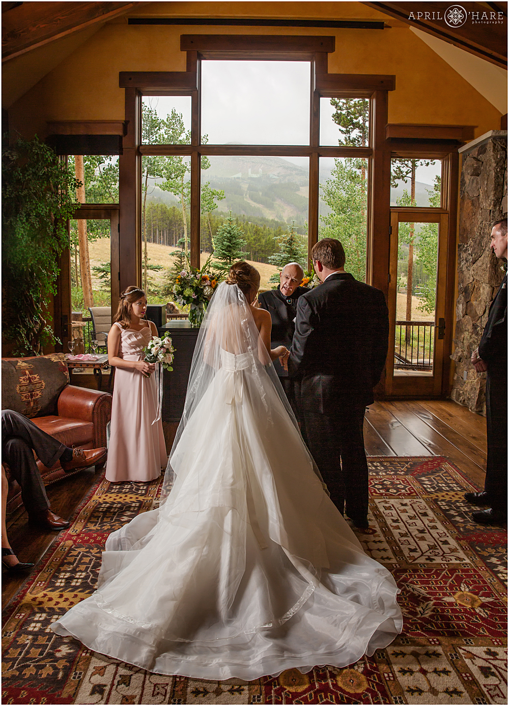Beautiful home wedding indoors in the great room of a private home in Breckenridge Colorado