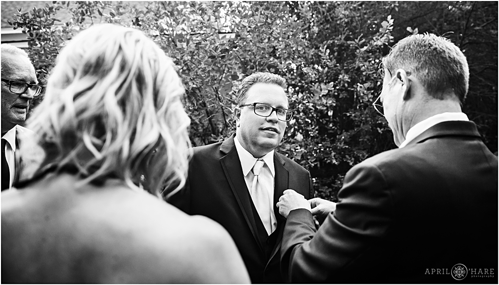 B&W wedding photojournalism in the garden at Chatfield Farms