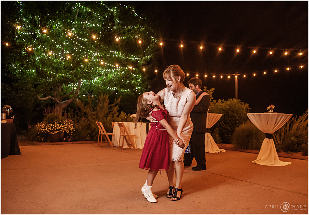 Dancing on the patio under the stars at a Littleton Garden Wedding at Night