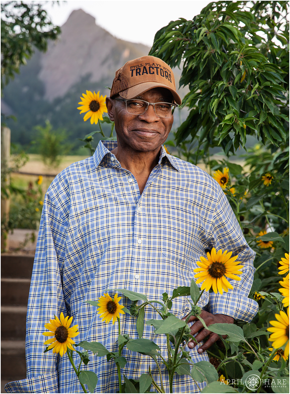 Classic portrait of a grandfather with sunflowers at Chautauqua Park in Boulder