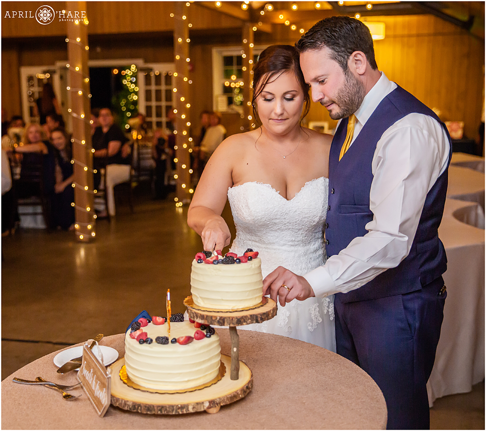 Cake Cutting at a Barn at Raccoon Creek Wedding Reception