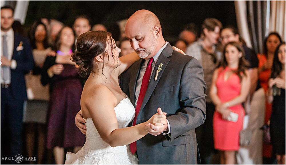 Father daughter dance inside the white tent at The Barn at Raccoon Creek