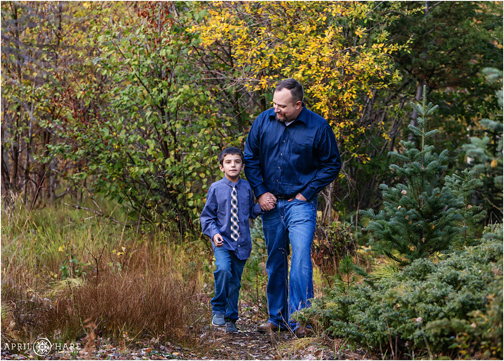Dad walks with his son at Colorado family session at Guanella Pass