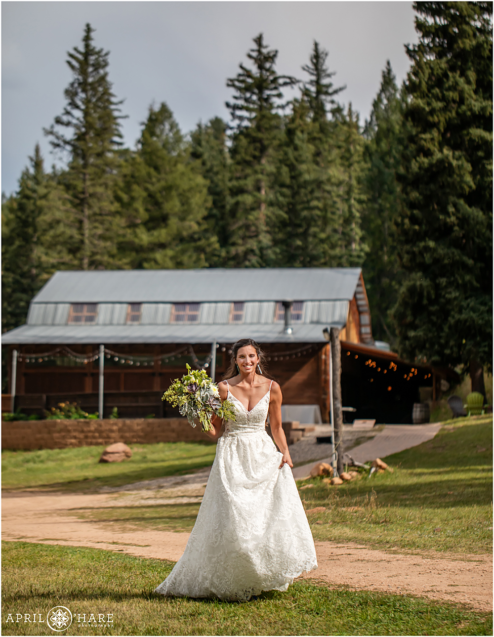 Bride walks to her groom for their first look at Wedgewood Weddings Mountain View Ranch in Colorado