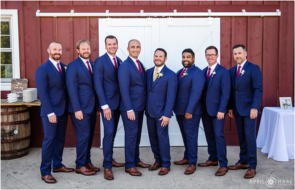 Formal portrait of the groom with his friends at The Barn at Raccoon Creek 