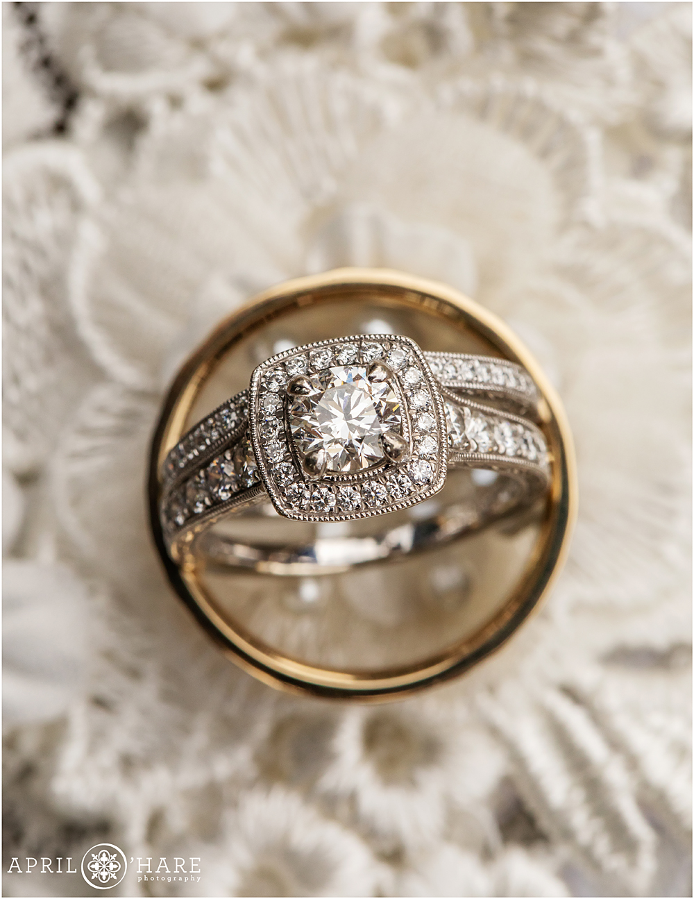 Pretty wedding ring detail photo on a lace garter Colorado Wedding Photographer