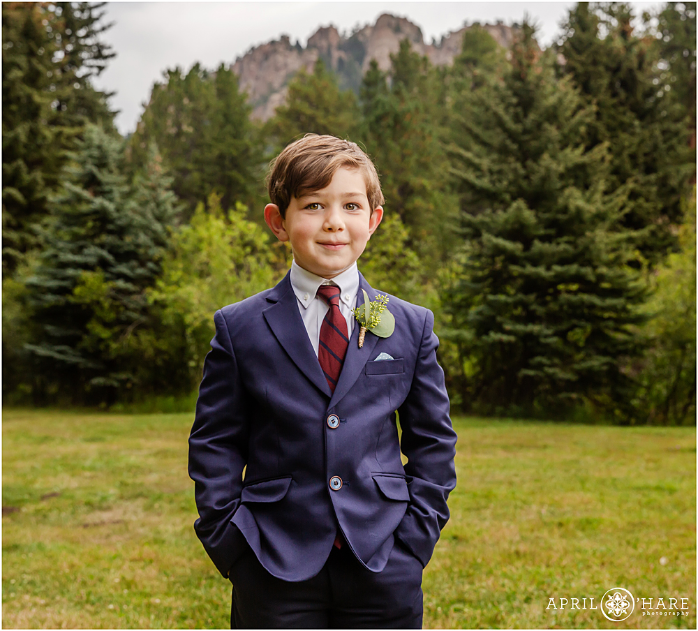 Ring bearer portrait at a Colorado mountain wedding