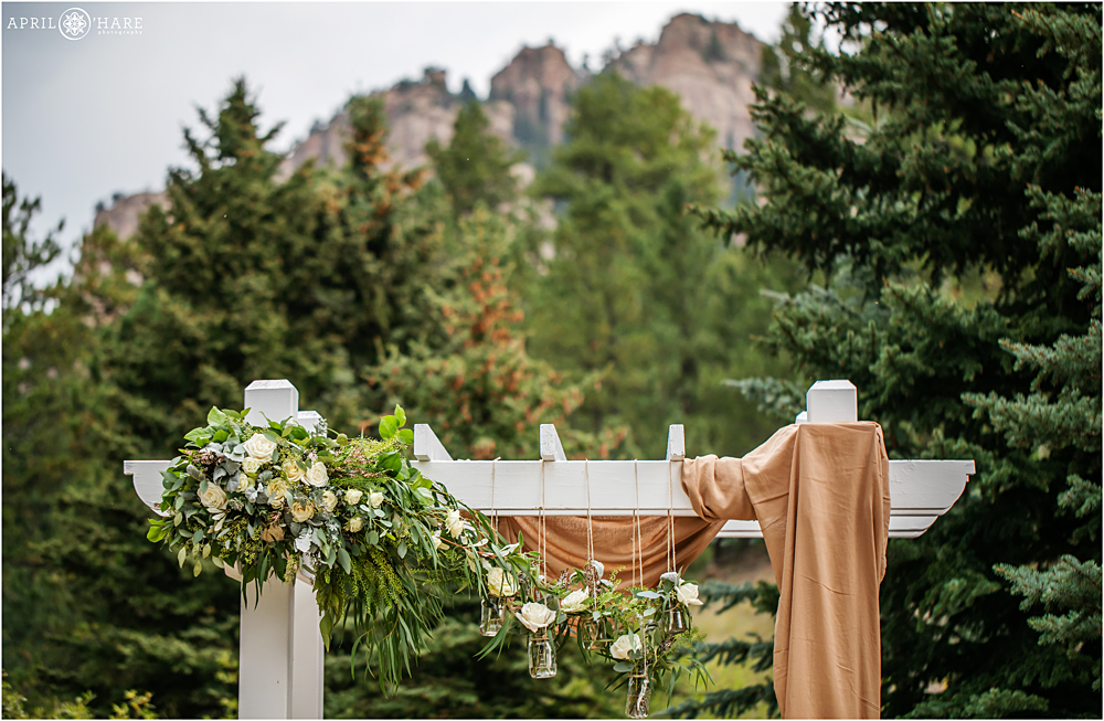 Pretty detail photo of the wedding arch at Wedgewood Weddings Mountain View Ranch in CO