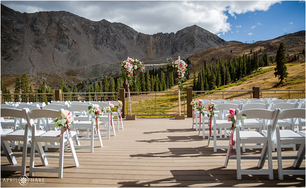 Pretty arch decorated with florals from Erin Ashley Design at A-Basin Ski Resort During Fall