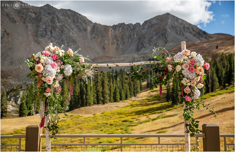 Close up of the floral arch for a fall wedding at A-Basin Ski Resort in CO