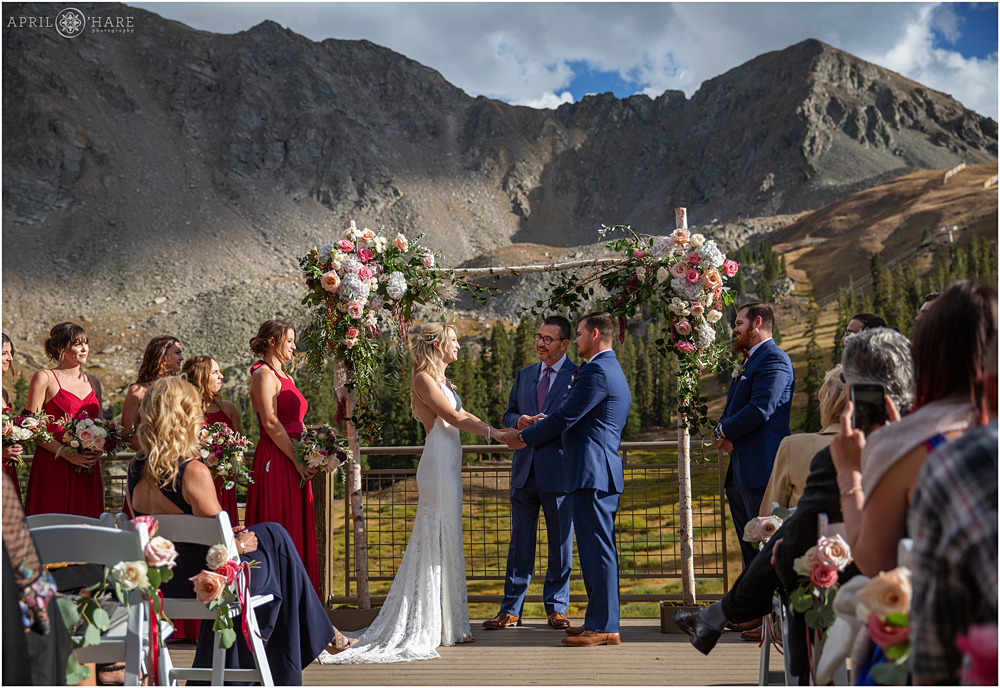 A beautiful sunny Colorado wedding day on a mountaintop at A-Basin
