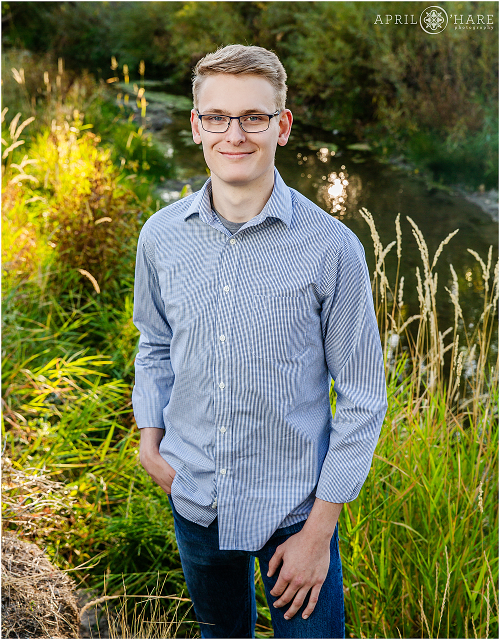 Headshot photo of a young man at McCabe Meadows during fall family photography session in Parker Colorado