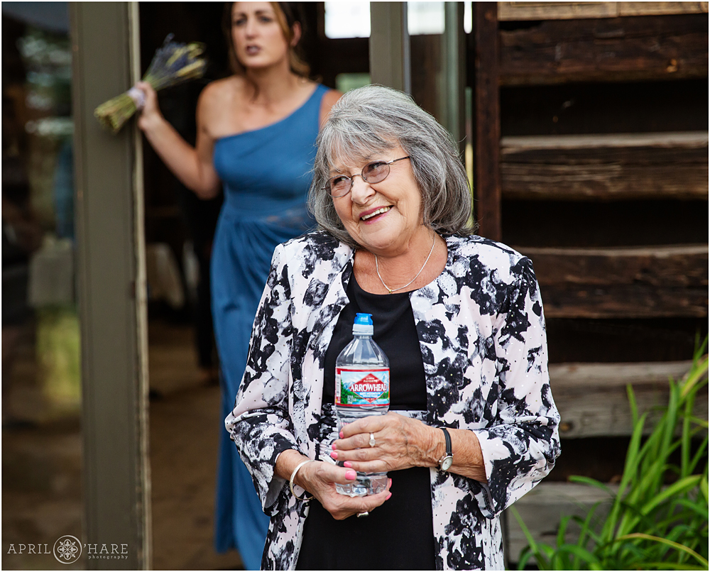 Grandma smiles at her granddaughter on her wedding day at The Barn at Evergreen Memorial Park