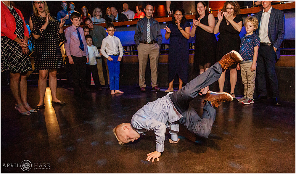 Young break dancer at a Bat Mitzvah party in Lowry Denver CO