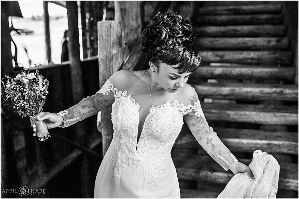 B&W Photo of a bride at the Barn at Evergreen Memorial Park in CO