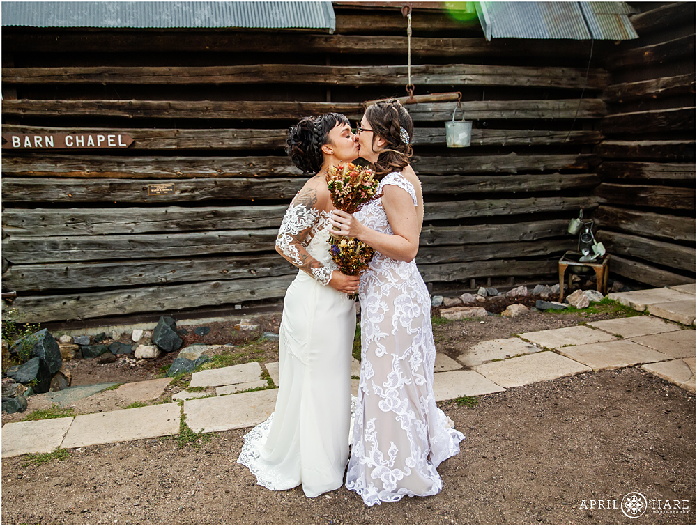 Two brides kiss at their same sex wedding in Colorado