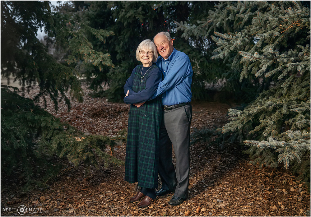 Grandma and Grandpa portrait in the trees at their home in Colorado