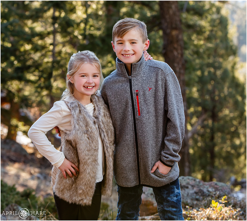 Sibling picture during Denver Family Photography session at Mount Falcon in Evergreen