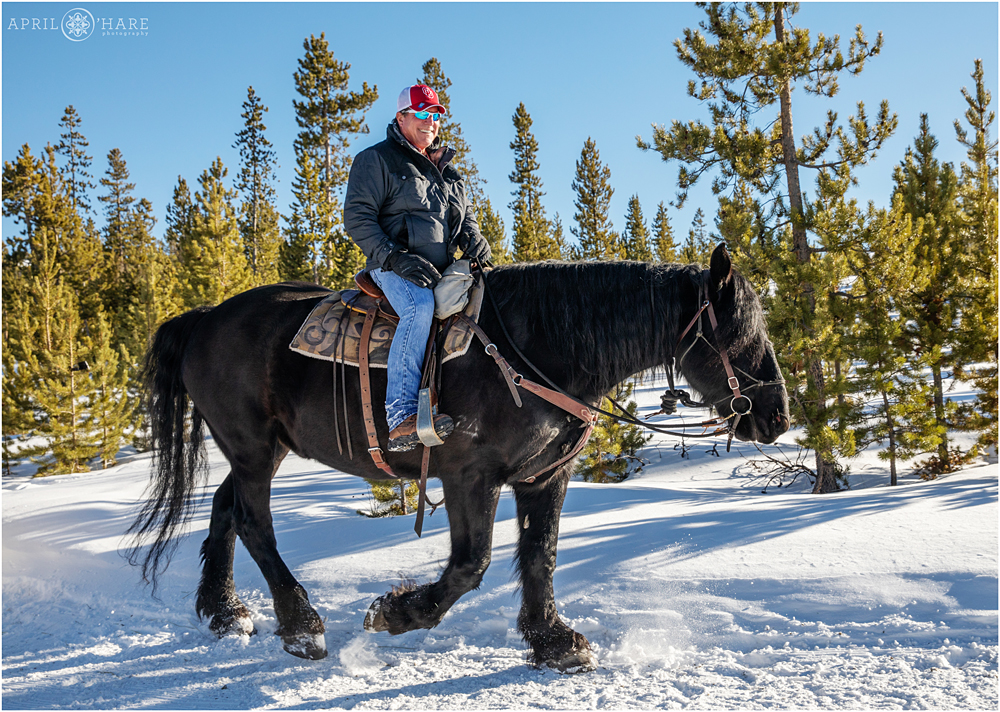 Family horseback riding excursion at Devil's Thumb Ranch in Colorado