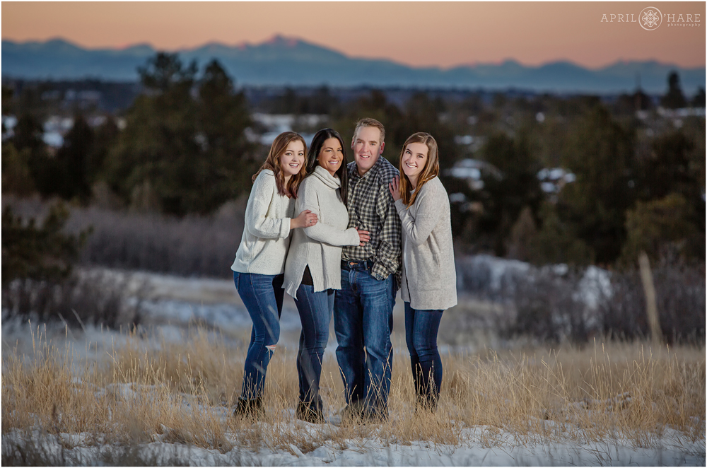 Beautiful winter family photography with mountain backdrop at Castlewood Canyon
