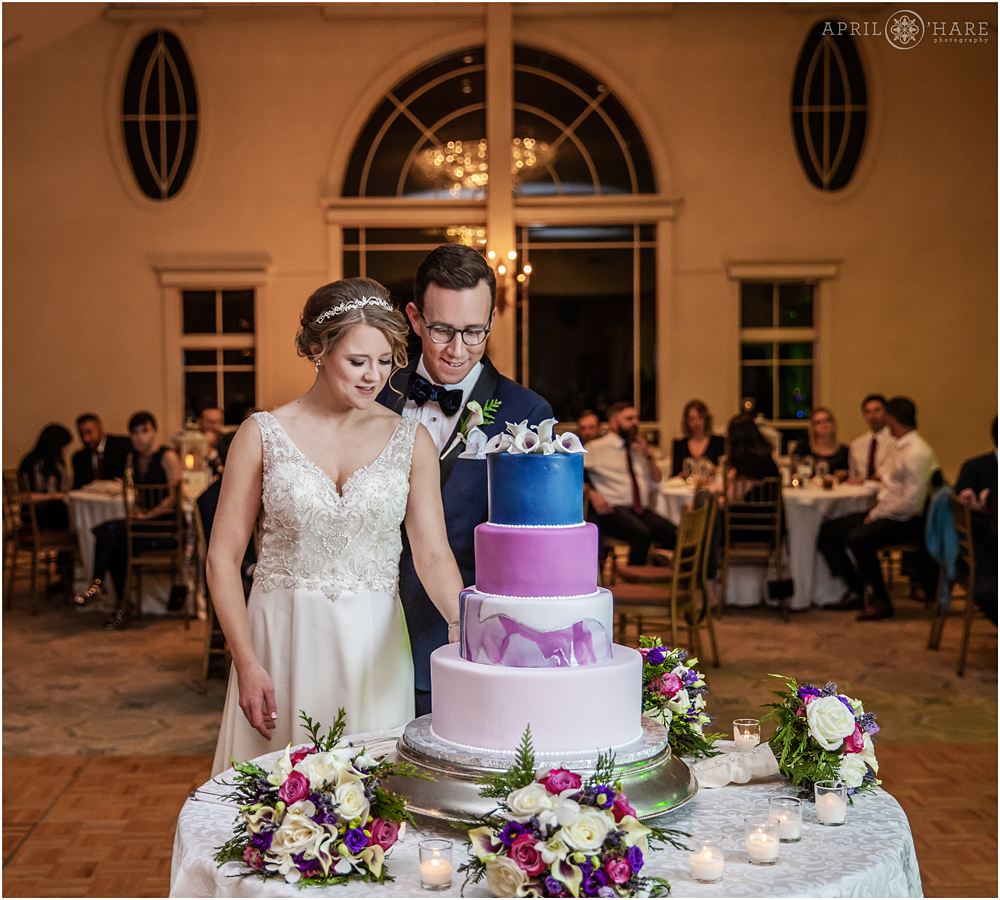 Beautiful 4 tiered purple blue and white cake from Montilio's Bakery Granite Links Golf Club
