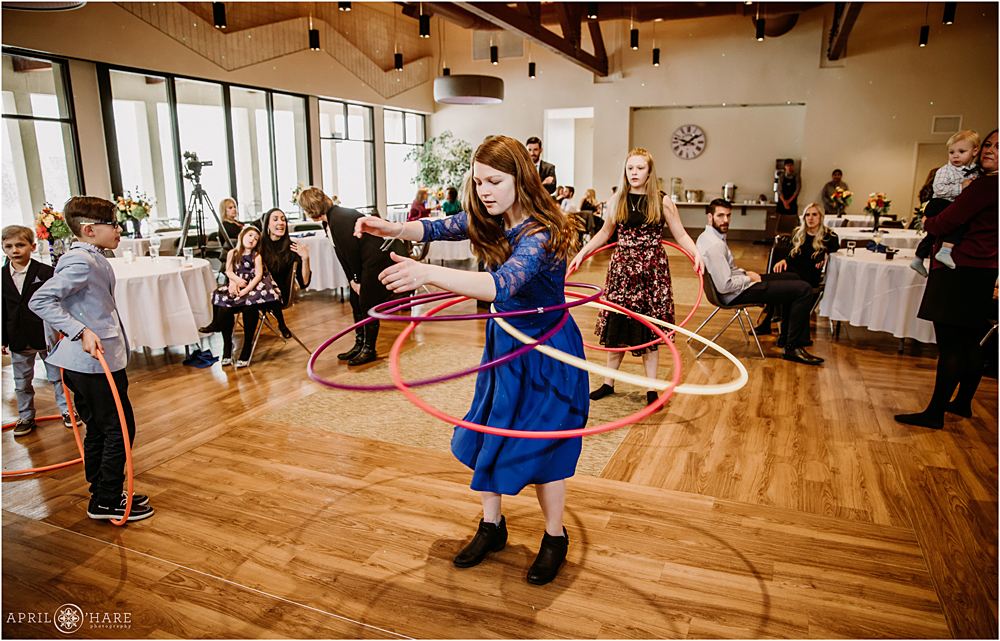 Bat Mitzvah girl playing with Hula Hoops Denver CO Jewish Party