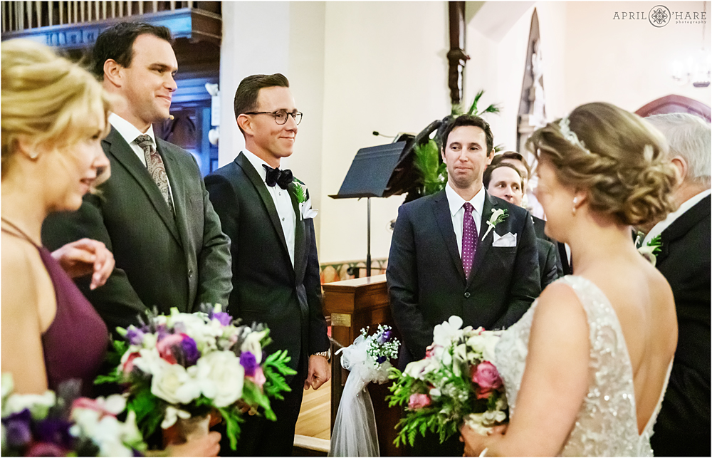 Groom smiles at his bride on their wedding day at Christs Church Episcopal in MA