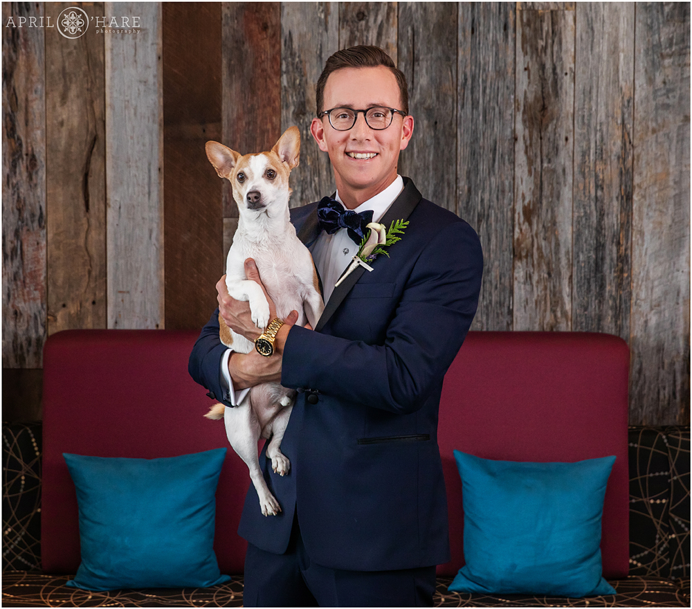 A groom with his furry best friend on his wedding day in Boston