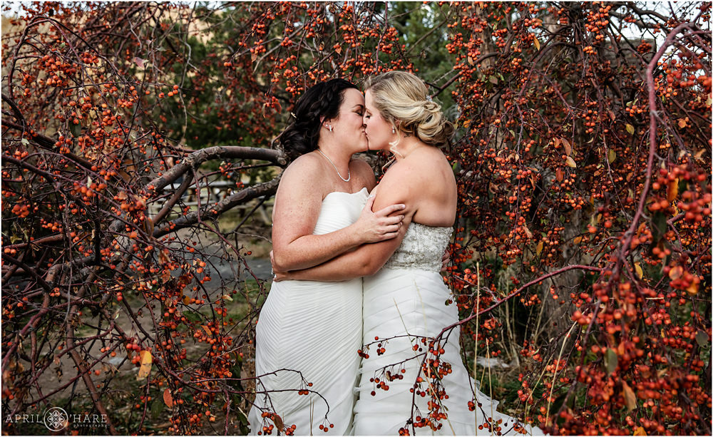 Two brides kiss on their wedding day in Colorado