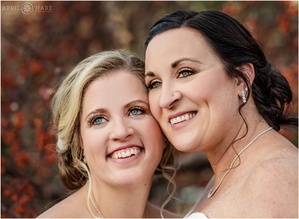 Two beautiful brides with pretty eyes in Colorado
