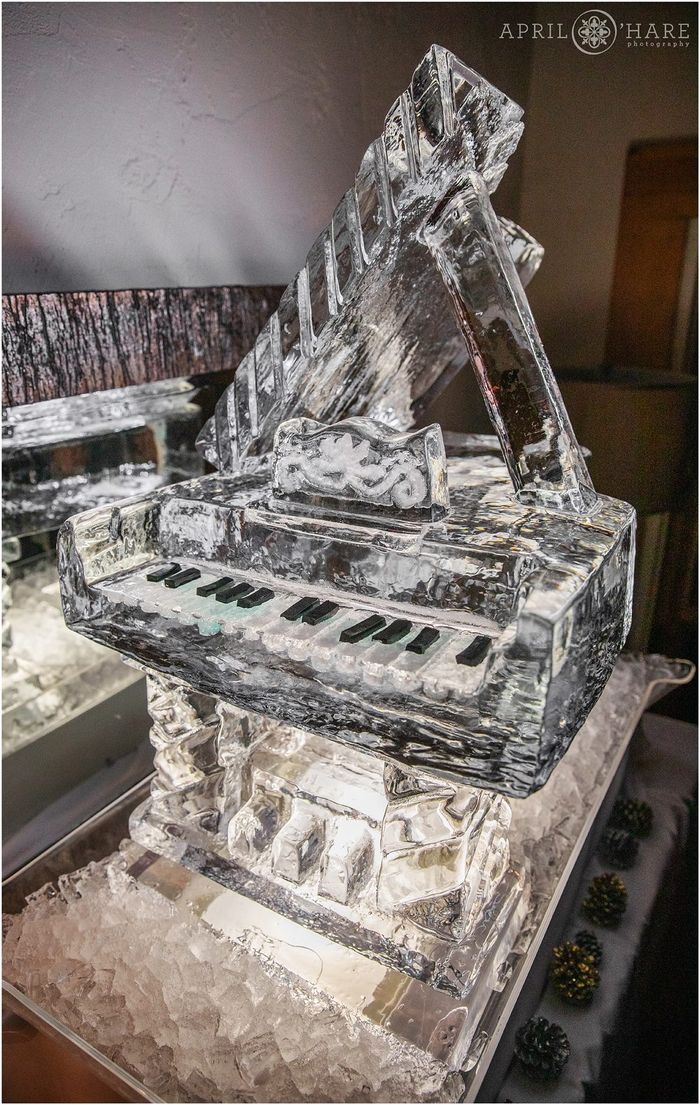 Grand Piano Ice Sculpture at a winter wedding at Alpenglow Stube at Keystone Resort in CO