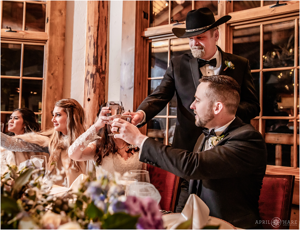 Wedding speeches and toasts inside Alpenglow Stube at Keystone CO