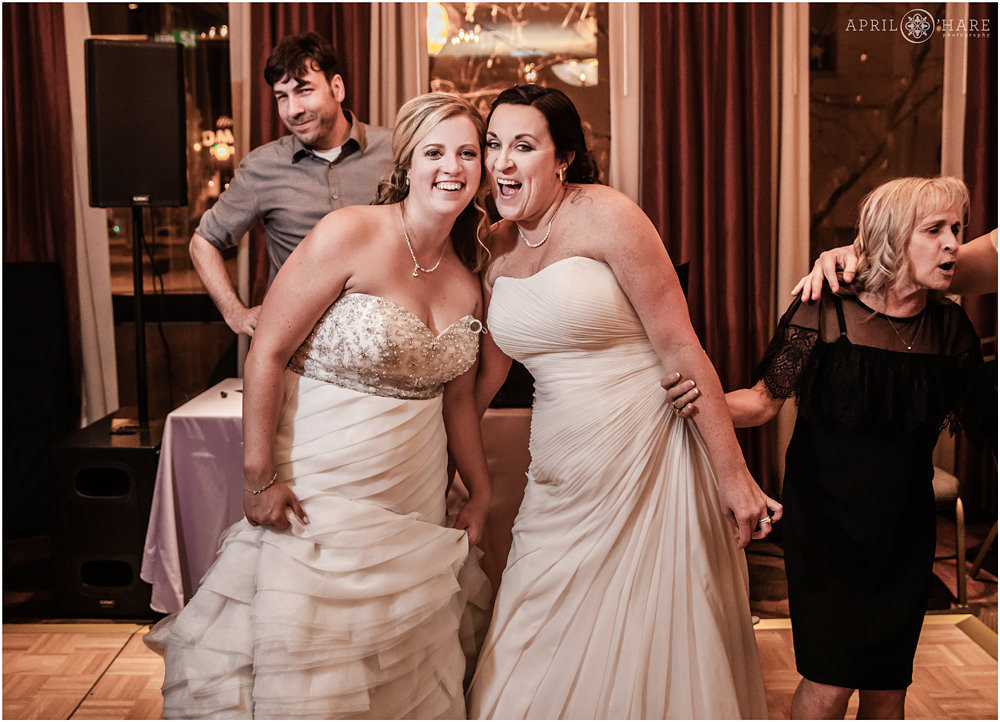 Happy brides on their wedding day at the Golden Hotel in Colorado