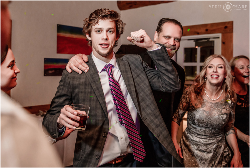 Dancing photos at a fun destination wedding reception in Colorado at Alpenglow Stube in Keystone