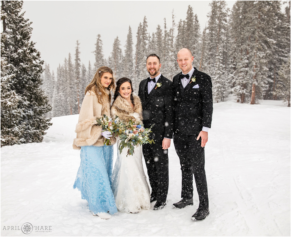 Wedding portraits on a snowy winter destination wedding day at Keystone Resort in Colorado